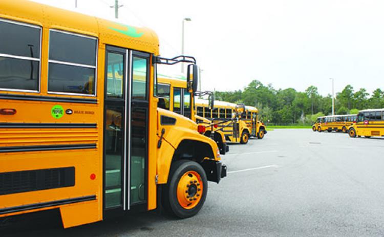 A bus carrying students from Q.I. Roberts Junior-Senior High School was hit Tuesday.