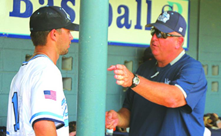 St. Johns River State College baseball coach Ross Jones (right) talks with pitcher Heston Mosley during a game in March. (MARK BLUMENTHAL / Palatka Daily News)