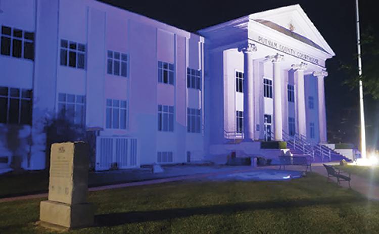 The Putnam County Courthouse in Palatka is illuminated blue in recognition of April being Child Abuse Prevention Month.