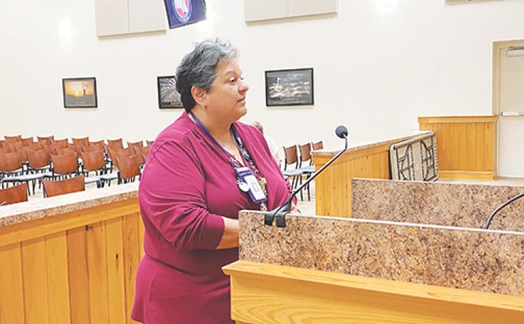 Mary Garcia, who until this week was the administrator of the state Department of Health in Putnam County, discusses COVID precautions with county commissioners at the start of the pandemic in March 2020.