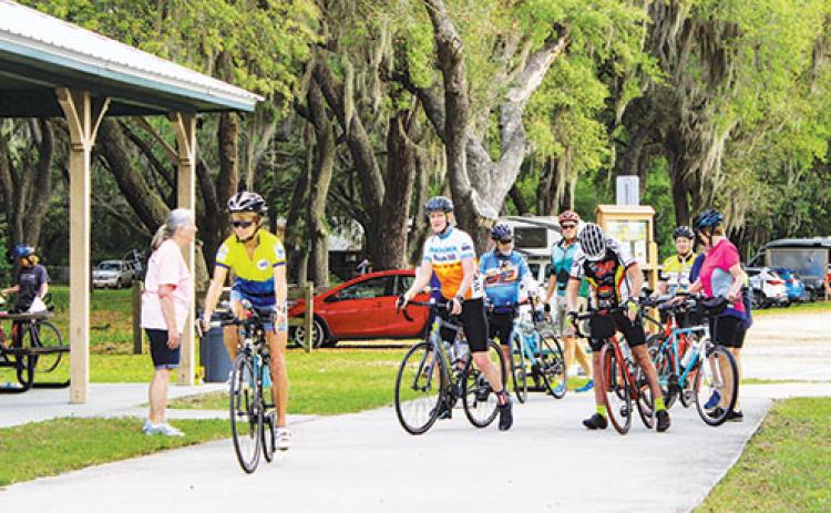 Cyclists prepare to travel along the Palatka-to-Lake Butler State Trial on Saturday as part of Celebrate Putnam Trails.