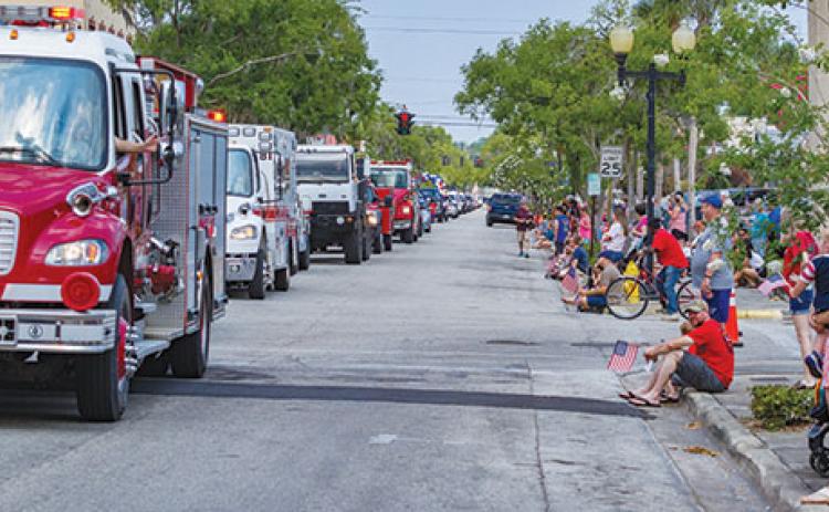 Hundreds of people line St. Johns Avenue during the 2019 Memorial Day parade in Palatka.
