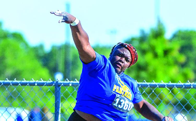 Palatka’s Torryence Poole lets loose of a throw during the shot put competition at the FHSAA 2A championships at Hodges Stadium at the University of North Florida. (FRAN RUCHALSKI / Special to the Daily News)