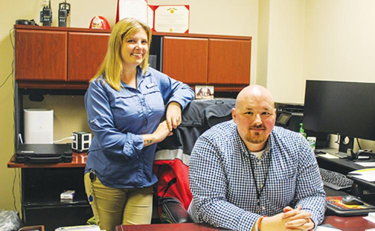 Putnam County Emergency Management Specialist Danelle Choate and Chief of Emergency Operations and Preparedness Steffen Turnipseed gather in the county’s Emergency Operations Center as they adjust to their new roles.