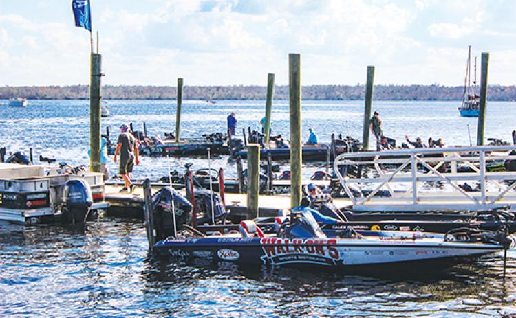 Anglers come in from a day on the St. Johns River and prepare for weigh-in during the 2021 Bassmaster Elite Series in Palatka in February.