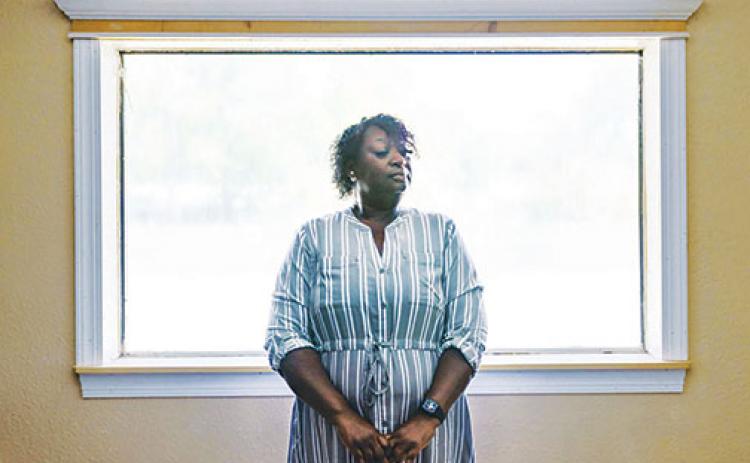 Latonya Crowley, the mother of Warren Williams, stands for a portrait in Palatka in April.