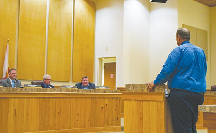 J.R. Grimes, executive director of public safety for Putnam County, talks to the Board of County Commissioners on Tuesday about Emergency Services response times.