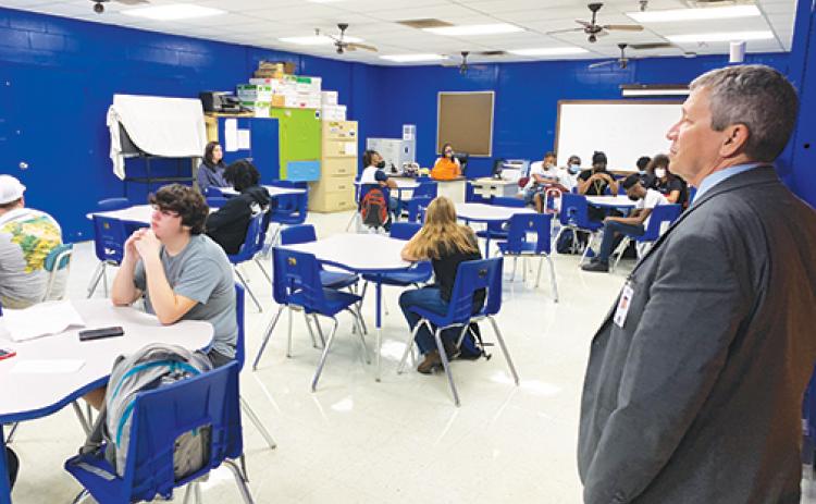 Superintendent Rick Surrency observes an advanced manufacturing class at Palatka Junior-Senior High School on Tuesday, the first day of school.