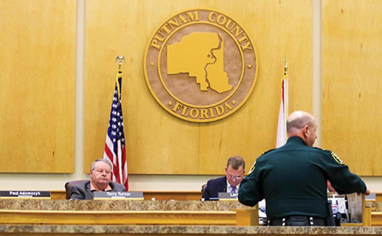 Putnam County Sheriff’s Office Col. Joe Wells discusses budget items with the Board of County Commissioners on Tuesday.