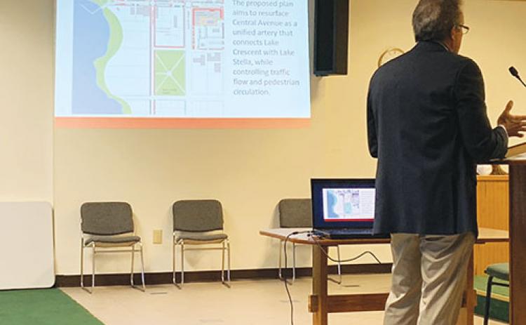 Crescent City City Manager Charles Rudd describes to commissioners plans outlined in the city’s Central Community Redevelopment Agency budget Thursday night.