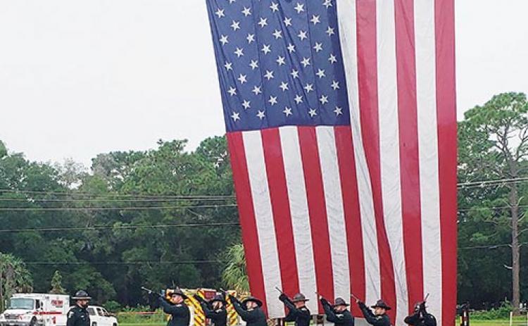 The Putnam County Sheriff’s Office honor guard marks the Sept. 11 ceremony with a 21-gun salute Saturday at the Putnam County Government Complex in Palatka.
