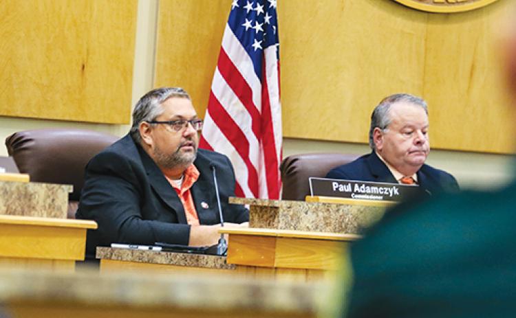 Putnam County Commissioner Paul Adamczyk, left, speaks Tuesday during a Board of County Commissioners meeting that included approving funds from the American Rescue Plan Act of 2021.