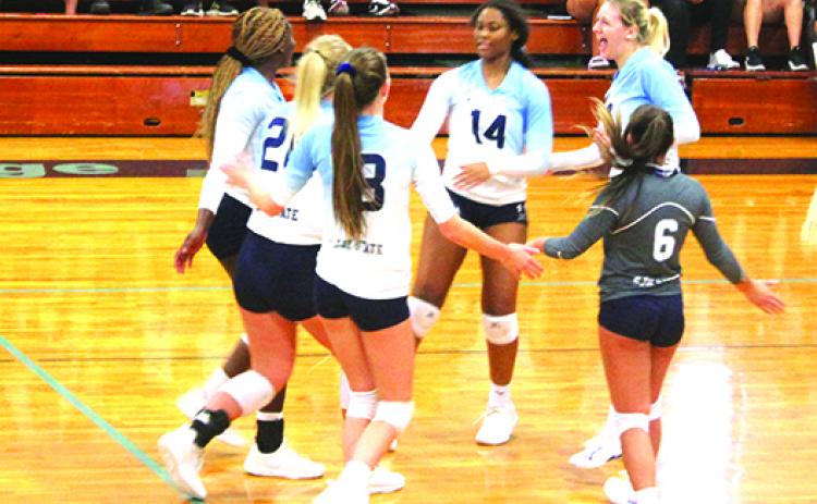 St. Johns River State College volleyball players celebrate a point recently against Lake-Sumter State College. The Vikings beat Santa Fe on Tuesday and now faces off with Pensacola State Friday night at home in the Sun-Lakes Conference. (MARK BLUMENTHAL / Palatka Daily News)