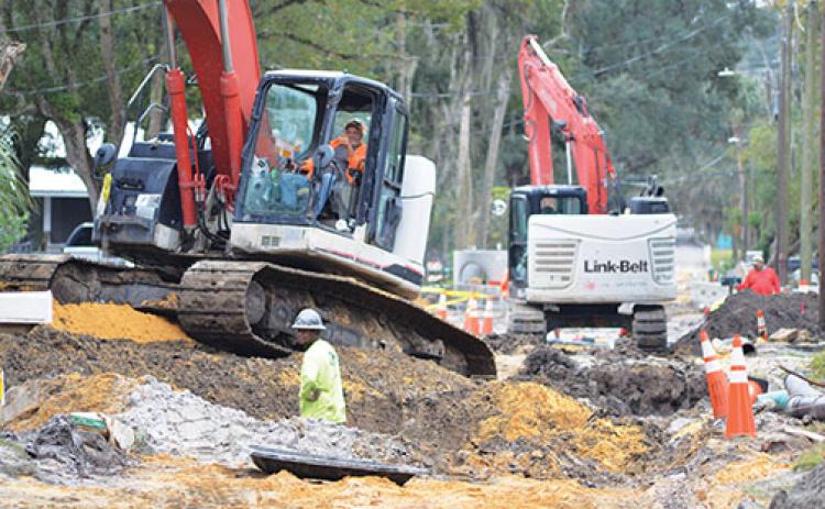 Construction crews dig up roads in a Palatka neighborhood so they can replace water lines that date back to the 1800s. 