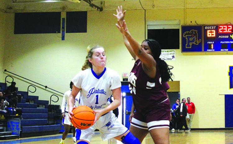 Heaven Jimenez (1) and her Palatka Junior-Senior High School girls basketball teammates face off with Gainesville Eastside tonight in the opening round of the District 4-4A tournament. (MARK BLUMENTHAL / Palatka Daily News)