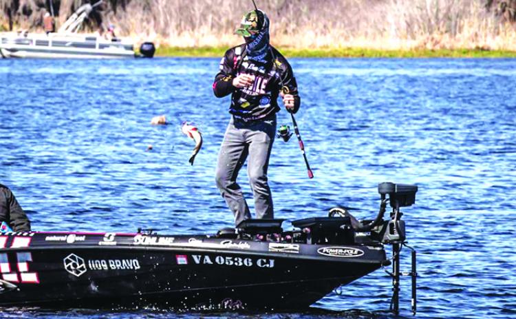 John Crews Jr. reels in one of his catches during Thursday’s opening day competition in the AFTCO Bassmaster Elite at the St. Johns River. (GREG WALKER / Daily News correspondent)