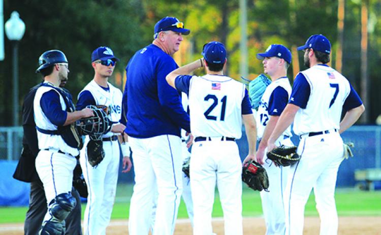 St. Johns River State College coach Ross Jones talks with Palatka High product and pitcher Layton DeLoach during a mound meeting against Florida State College-Jacksonville recently. (MARK BLUMENTHAL / Palatka Daily News)