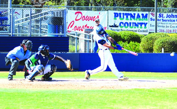 St. Johns River State College’s Ramses Cordova rips a fifth-inning double Friday against Pensacola State. (MARK BLUMENTHAL / Palatka Daily News)
