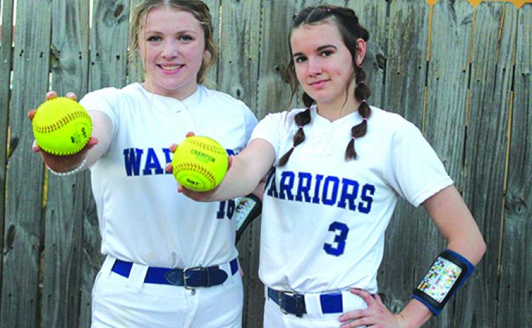Peniel Baptist Academy pitchers Lexi Peacock (left) and Alexis Wallace should make a tough 1-2 combination for opposing hitters. (MARK BLUMENTHAL / Palatka Daily News)