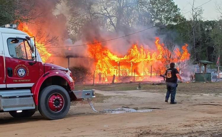 Flames ravage the Interlachen home on Tuesday evening. Credit: Teshia Chesser
