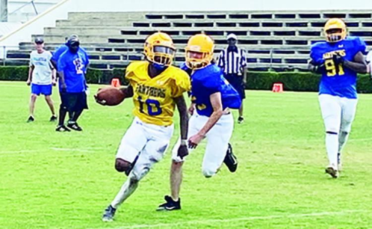 Palatka’s Tommy Offord finds his way to the end zone for a score during last week’s Blue-Gold Game. (COREY DAVIS / Palatka Daily News)