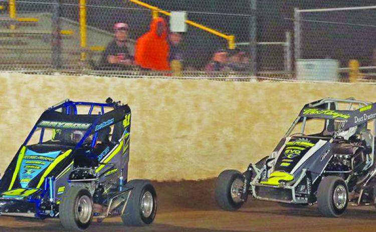 Cody Brown (41) takes the checkered flag just ahead of Kevin McKenzie in the Non-Winged Mini Sprints race last year at Putnam Raceway. (Courtesy of Putnam Raceway Facebook Page)