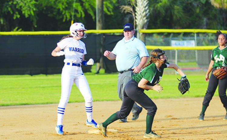 Alexis Wallace (left) pitched and helped hit her Peniel Baptist Academy softball team to a third straight district championship this spring. (MARK BLUMENTHAL / Palatka Daily News)