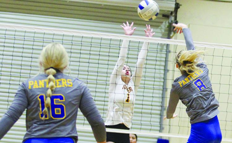 Palatka's Ava Richardson goes up for a kill attempt against Crescent City's Riley Arroyo during Saturday's match in the Putnam County Tournament. (MARK BLUMENTHAL / Palatka Daily News)