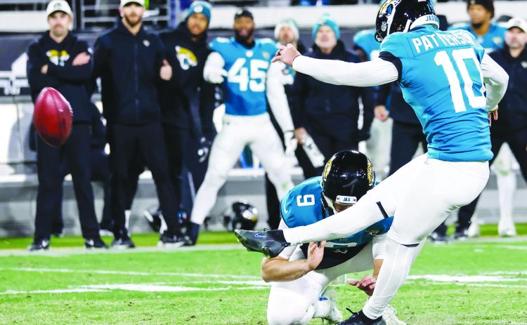 Jacksonville’s Riley Patterson delivers the game-winning field goal to defeat the Los Angeles Chargers, 31-30, on Saturday night. Holding the kick is Logan. (JOHN STUDWELL / Special to the Daily News)