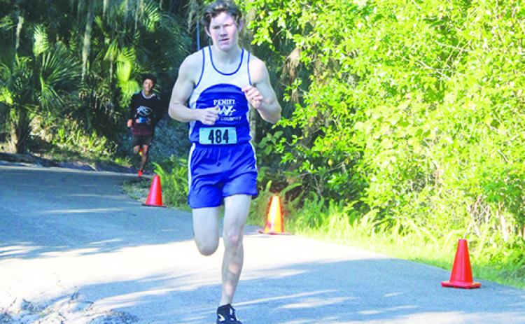 Peniel Baptist Academy's Caleb Baker was named to the All-County boys cross country team for the third time in his career. (MARK BLUMENTHAL / Palatka Daily News)