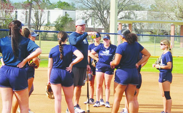 Second-year St. Johns River State College softball coach Joe Pound talks to his players during practice Wednesday. (MARK BLUMENTHAL / Palatka Daily News)