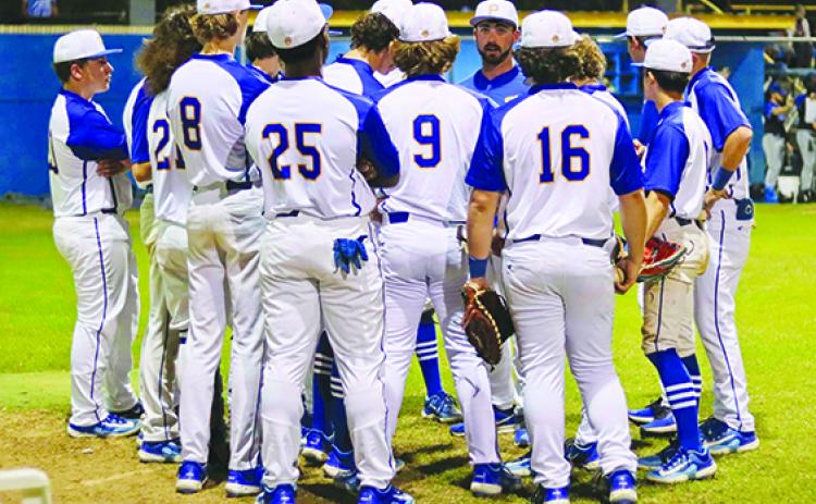 Assistant coach Taran Tipton talks to the Palatka Junior-Senior High baseball team during the team’s recent county championship victory. (RITA FULLERTON / Special to the Daily News)
