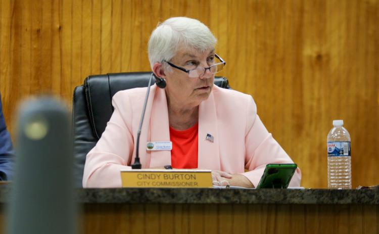 SARAH CAVACINI/Palatka Daily News. Crescent City Commissioner Cynthia Burton listens to conversations Thursday during a city commission meeting.