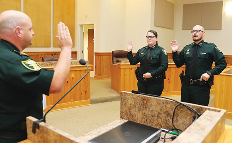 Photo courtesy of the Putnam County Sheriff’s Office Putnam County Sheriff’s Office Deputy Karly Yoder, center, gets sworn in as she is promoted to lieutenant in 2018.