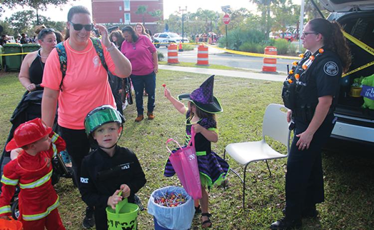 File photo – Families arrive at Trunk or Treat in Palatka in 2022.