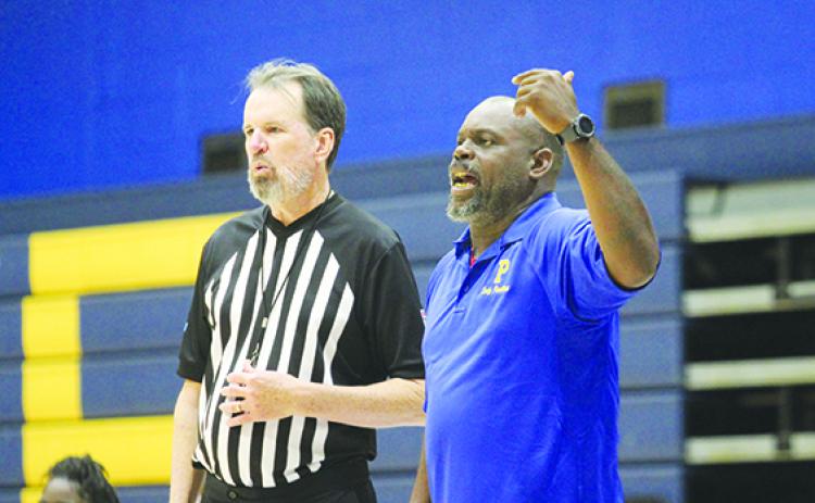 Craig Washington shouts out directions to his Palatka Junior-Senior High School girls basketball team during a 46-16 triumph over Crescent City on Wednesday night. Washington was fired as head coach on Thursday for an incident that took place Dec. 29. (MARK BLUMENTHAL / Palatka Daily News)