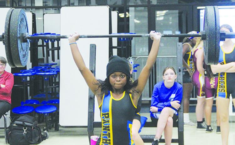 Palatka’s Ymira Passmore, here winning the county 101-pound championship in December, has a chance to win a state meet gold medal. (COREY DAVIS / Palatka Daily News)