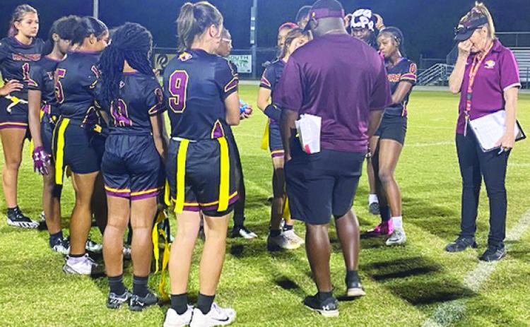 Crescent City Junior-Senior High School flag football players listen to head coach Keenan Henry (back to picture) after losing to Deltona Pine Ridge, 7-6, in the District 11-1A tournament. (COREY DAVIS / Palatka Daily News)