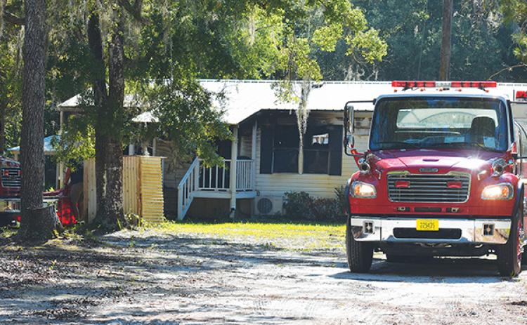 BRANDON D. OLIVER/Palatka Daily News – A woman died in this 161 Oak Run Road home in Crescent City on Thursday after a fire broke out in her bedroom, authorities said.