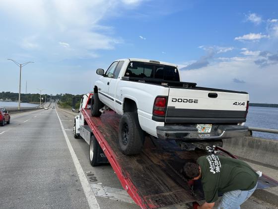 Submitted by Nick Haan. East Palatka man Nick Haan snaps a photo Tuesday of his car being towed off Memorial Bridge in Palatka.