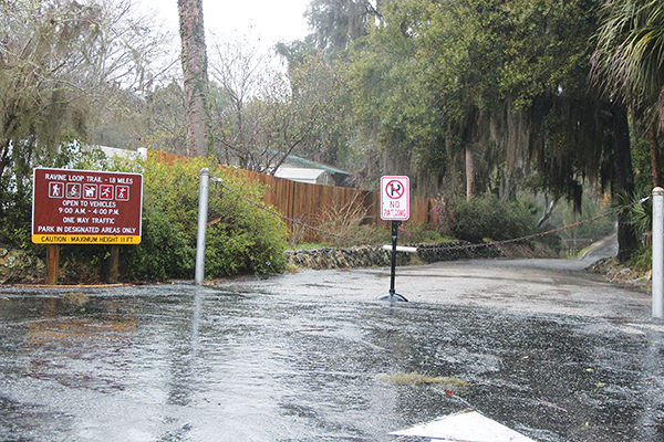 SARAH CAVACINI/Palatka Daily News – The paved trail at Ravine Gardens State Park in Palatka is closed earlier than normal as the storm passed over Putnam County on Tuesday.