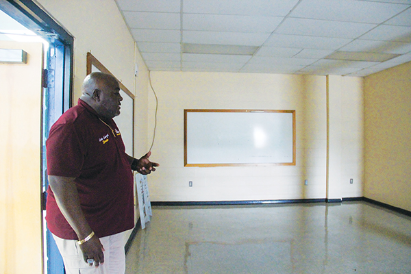 SARAH CAVACINI/Palatka Daily News – Palatka Community Affairs Director Eddie Cutwright suggests Tuesday this empty room at the former Jenkins Middle School could become a computer lab for the community.