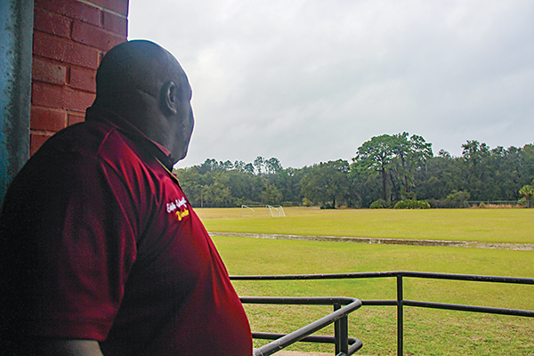 SARAH CAVACINI/Palatka Daily News – Cutwright looks out at the fields behind Jenkins that the city’s recreational sports teams use for soccer.
