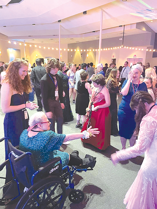 Submitted photo – Guests with special needs visit each other during the evening, which had 90 honorees in attendance.