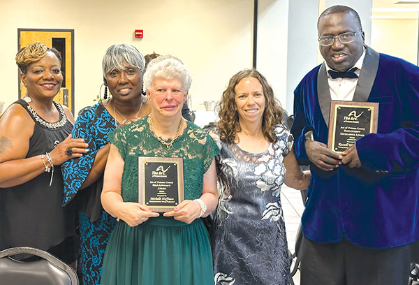 Submitted photo – From left, Sharon Betts, direct service provider; Elethyia Cruz, group home manager; award winner Michelle Huffman; Patty Dame manager of administrative services; and award winner Russell Washington gather for a picture at the banquet. 