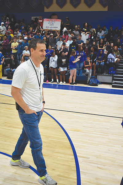 BRANDON D. OLIVER/Palatka Daily News – Palatka Junior-Senior High School Assistant Principal Michael Chaires walks in the school gym, where students and employees partook in a pep rally Friday in celebration of him being named the state’s Assistant Principal of the Year.