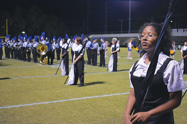 BRANDON D. OLIVER/Palatka Daily News –  Members of the Palatka Junior-Senior High School marching band prepare to perform their halftime show during the Panther Prowl on Thursday.