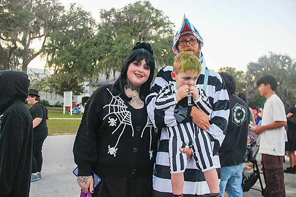 SARAH CAVACINI/Palatka Daily News – A family dressed as characters from Beetlejuice have fun Tuesday during Trunk or Treat in Crescent City.