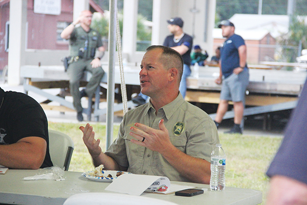 SARAH CAVACINI/Palatka Daily News – Sheriff Gator DeLoach asks for more napkins Friday during the Anything Butt food-tasting competitions at the Ten-24 Foundation fundraiser at the Putnam County Fairgrounds.