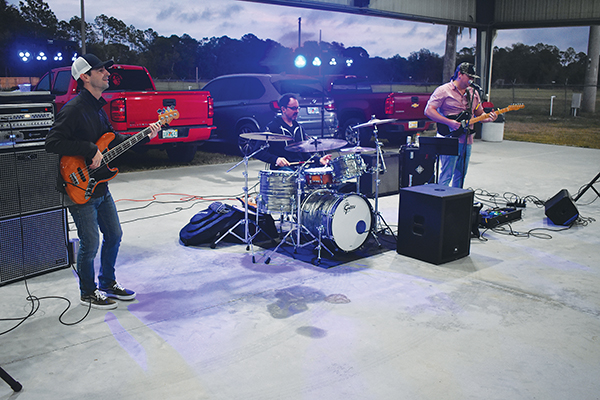 BRANDON D. OLIVER/Palatka Daily News – The band Paper City Hustlers plays Friday, the first day of the Ten-24 Foundation fundraiser at the Putnam County Fairgrounds in East Palatka.